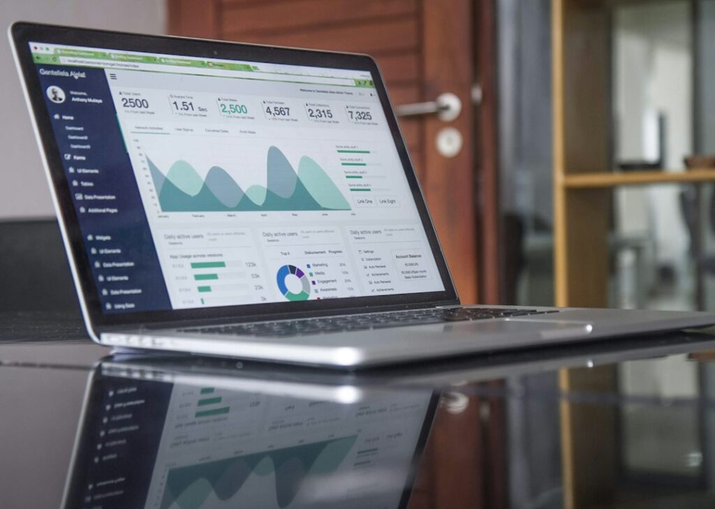 Marketing performance charts on a laptop